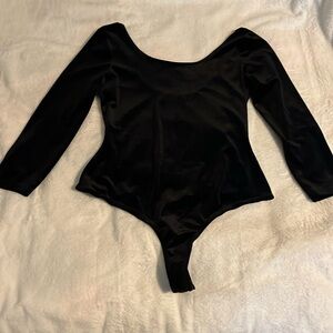 Black suede material womens bodysuit size small from GUESS worn once!